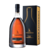 Fľaša gruzínskeho brandy Sarajishvili VSOP vedľa čierno-žltej darčekovej krabičky s nápisom Sarajishvili