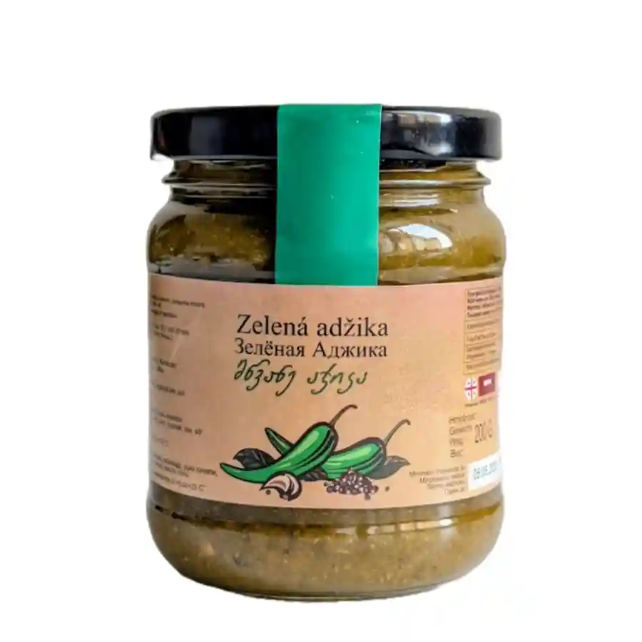 Adžika zelená – 200 g Zelená adžika je tajnou zbraňou každého gurmána. Rozmiešajte ju v troche olivového oleja a získate dokonalú marinádu na kuracie alebo bravčové mäso. Výborne si rozumie aj s pečenou zeleninou alebo zemiakmi. Adžika zelená – 200 g
